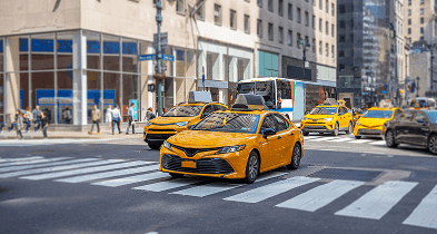 Uber-style instant taxi service with yellow taxis ready for on-demand booking